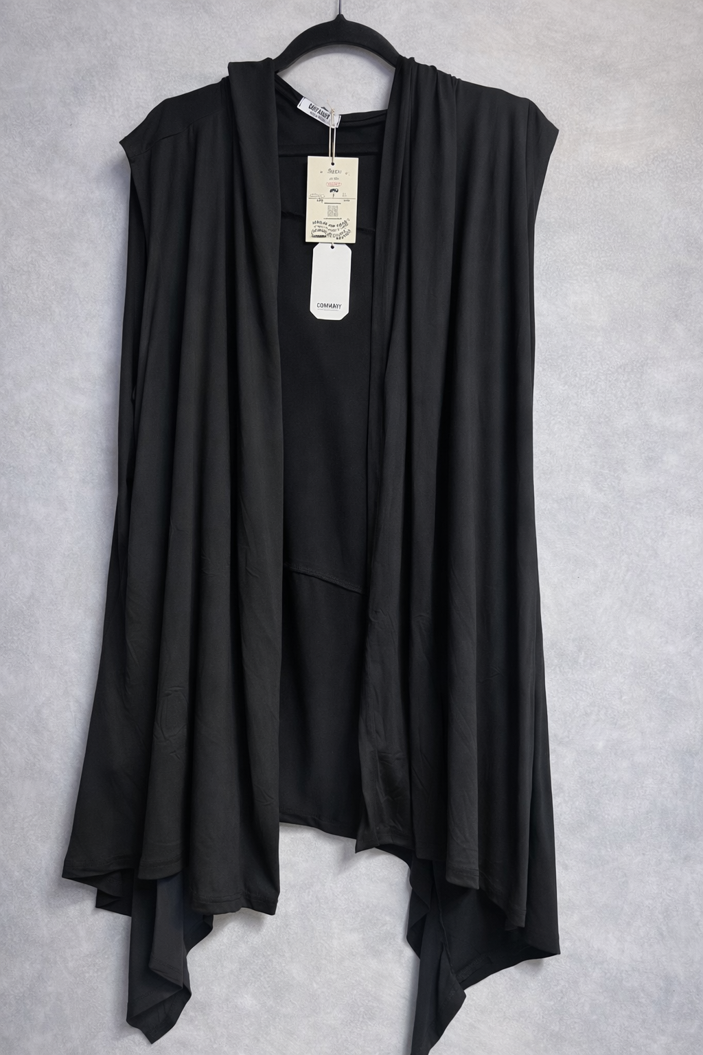 Capa sin mangas con capucha